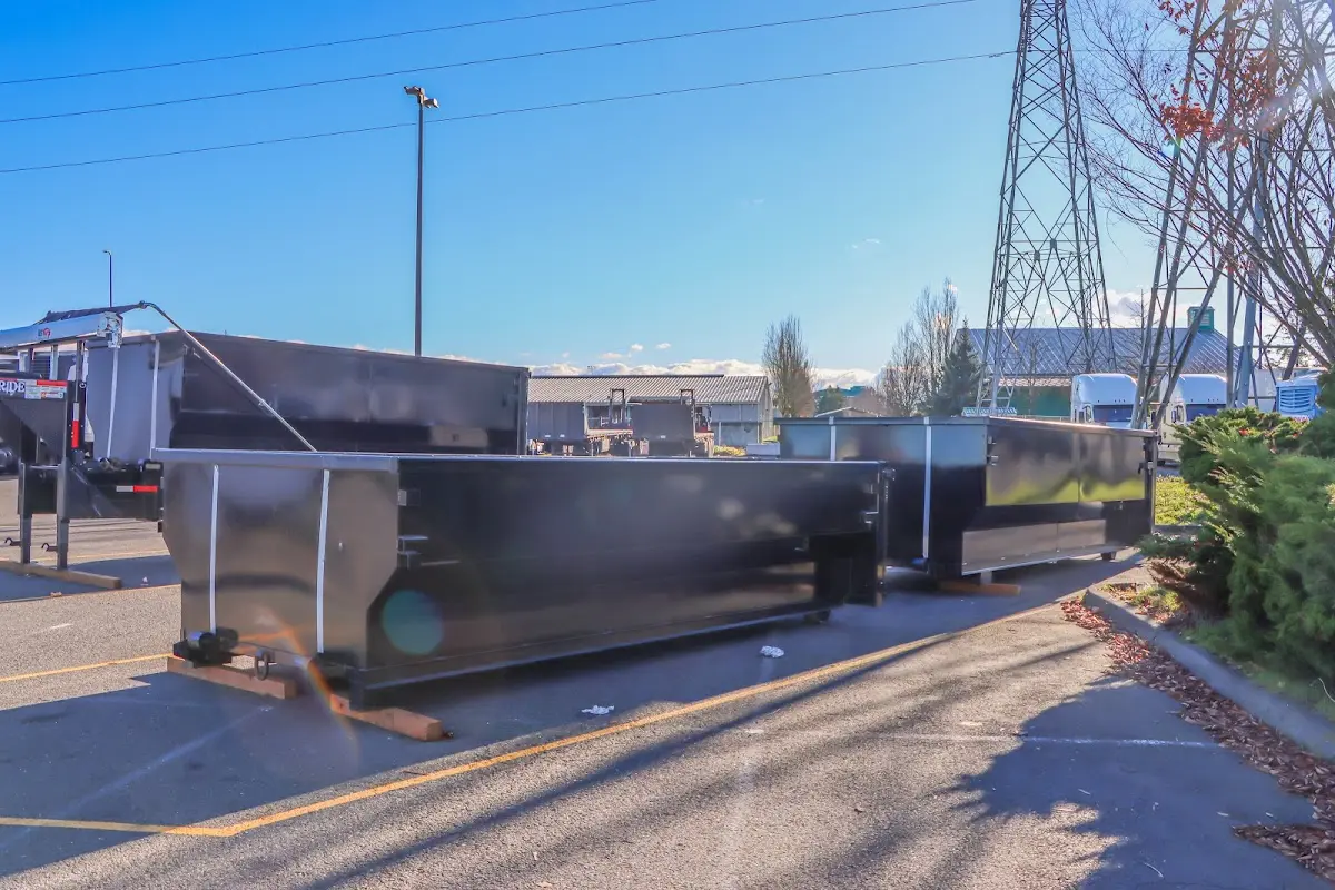Roll-off dumpster ready for waste disposal at job site for Concrete Dumpster Rental in Kenton
